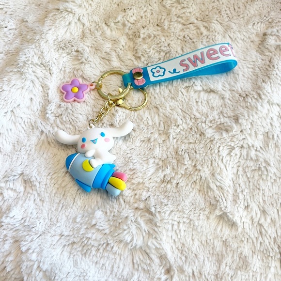 Sanrio Cinnamoroll on a Rocket Keychain Wristlet Bag Charm - Picture 1 of 2